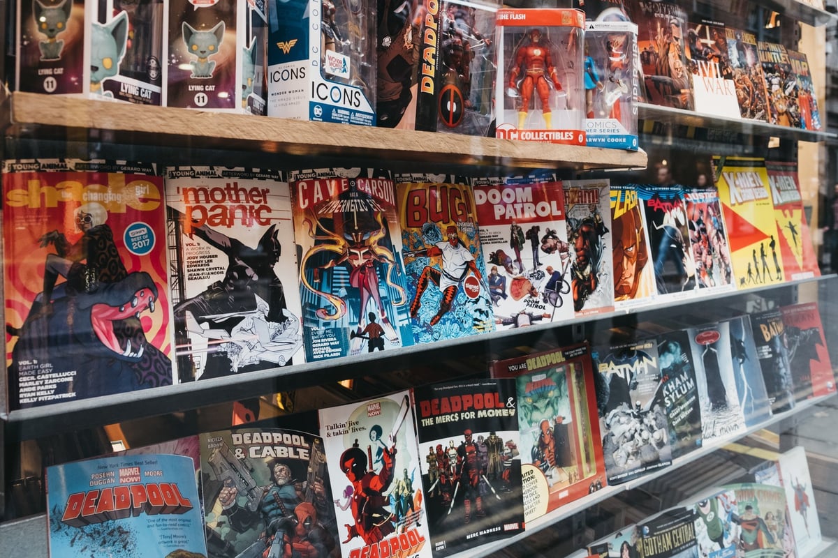 A wall of comic books on display in an independent comic shop